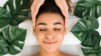 head-massage-afro-girl-getting-spa-treatment-BXBUA4N.jpg