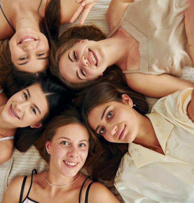 Top view of group of happy women that is at a bachelorette party
